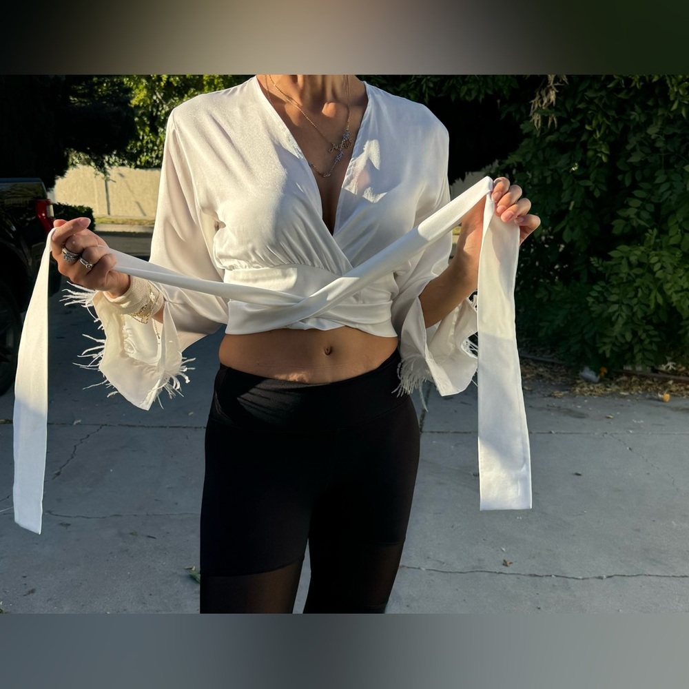 White feather wrap top #festivalvibes #partytop